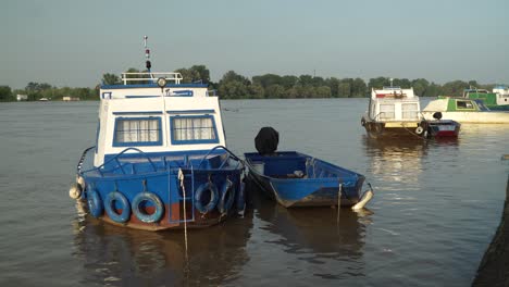 Boats-on-river-Sava-in-Brcko-district,-Bosnia-and-Herzegovina