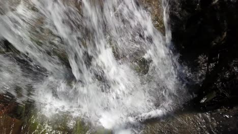 Aerial-flyover-of-the-crest-of-a-waterfall-near-Boone-North-Carolina