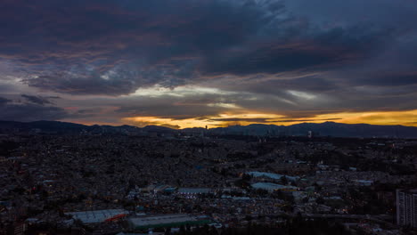 Aerial-hyperlpase-of-a-sunset-from-the-Mixcoac-zone-in-Mexico-City