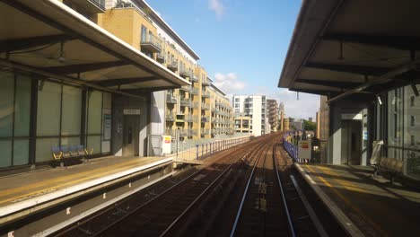 London-England-September-2022-rear-view-of-DLR-train-leaving-Limehouse-Station