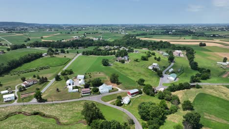 An-aerial-flight-over-the-rural-farmland-of-southern-Lancaster-County,-Pennsylvania
