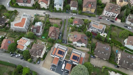 Drone-aerial-view:-neighborhood-in-Lausanne,-town:-Houses-and-garden-in-the-capital-city-in-Vaud,-Switzerland