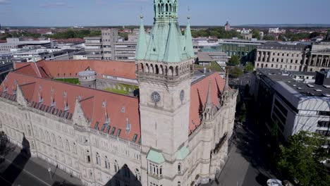 Clock-tower-of-town-hall-in-Braunschweig,-Germany,-Slow-drone-ascend