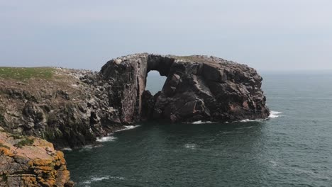 Medium-shot-of-Bullers-cliffs-looking-to-Dunbuy-arch