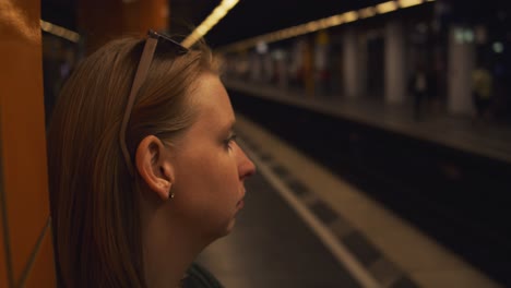 Woman-waiting-at-the-railway-on-the-subway---slow-motion