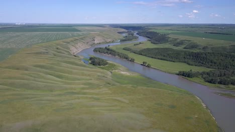 Beautiful-aerial-view-of-a-bucolic-prairie-river-valley