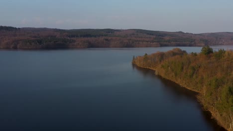 Drone-footage-over-a-lake-in-southern-Sweden,-Västersjön-outside-Ängelholm-in-Skåne