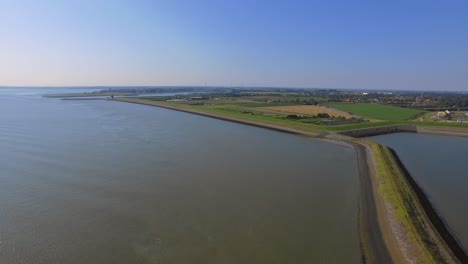 Manmade-bay-harbour-surrounded-by-dykes-in-Kruingen,-the-Netherlands