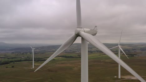 A-close-up-of-a-wind-turbine-in-a-field