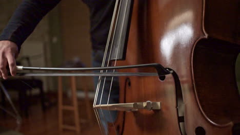 Footage-Of-A-Musician-Playng-A-Double-Bass-With-A-Bow-CLOSEUP