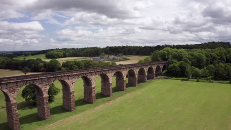 Backwards-Dolly-Shot-Alongside-Crimple-Valley-Viaduct-in-North-Yorkshire-on-a-Summer’s-Day