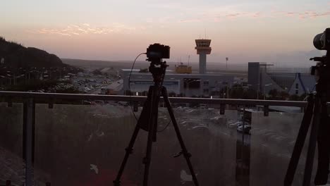 Panning-from-left-to-right-capturing-two-Cameras-capturing-Curacao-International-Airport-when-Dusk-is-Near