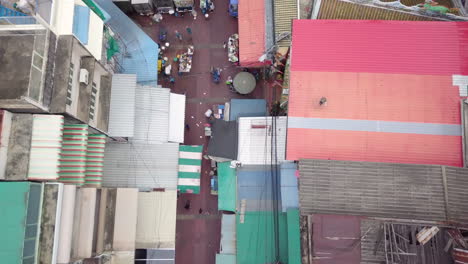Aerial-of-Bangkok-Market-Looking-Down-and-Onto-the-City,-Thailand