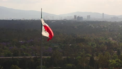 Mexican-flag-waving-in-campo-marte-México-city