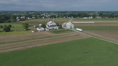 Aerial-View-of-Amish-Farmer-Seeding-His-Field-with-6-Horses