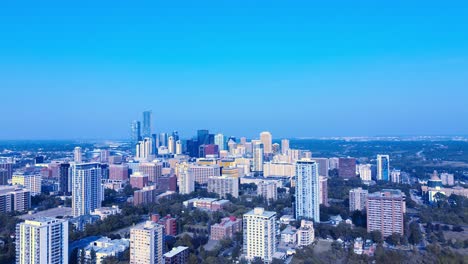 2-3-Edmonton-Downtown-Summer-flyover-residential-towers-overlooking-river-valley-park-clear-day-in-Alberta-Canada-high-end-condos-residential-buildings-next-to-the-Legislature-of-Canada-Federal-4k40