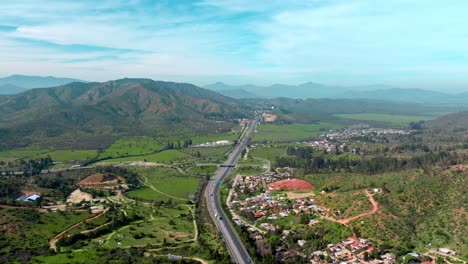 Panoramic-aerial-view-of-route-68-Santiago-Valparaíso-between-the-mountains-of-central-Chile