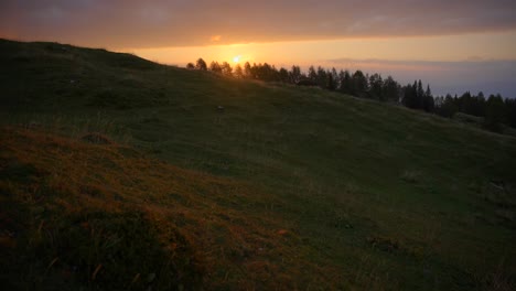 Down-to-up-movement-with-a-gimbal-of-footage-in-the-Slovenian-mountains-up-in-the-alps-at-an-incredible-sunrise-in-beautiful-colors-with-a-camera-going-slowly-forward