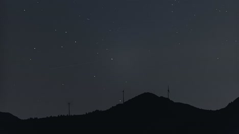 Perseids-meteor-shower-over-wind-turbines-in-the-skyline