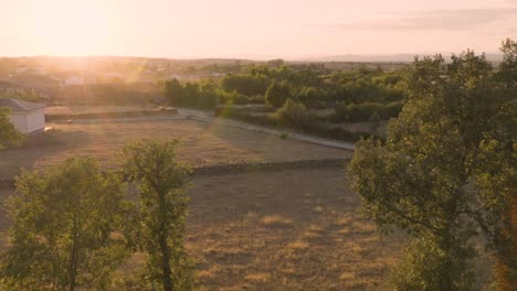 Aerial-establishing-shot-of-rural-remote-road-in-spain-at-sunset