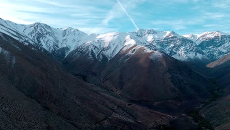 Panoramic-aerial-view-of-the-snow-capped-Andes-Mountains,-northern-Chile