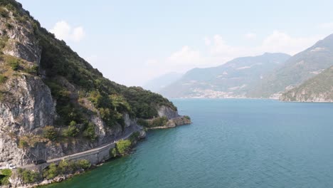 Amazing-aerial-view-of-mountains-and-lake-iseo-from-Riva-di-Solto,-Baia-dal-Bogn,Bergamo,Italy-1