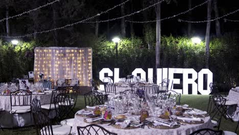 Night-event-dinner-on-a-private-garden-ready-to-begin,-no-people