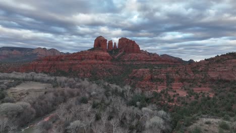 Natural-Sandstone-Butte-Cathedral-Rock-In-Sedona,-Arizona-Under-Cloudy-Sky-At-Sunset