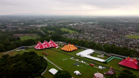 Slow-Aerial-Flyover-With-Pan-Down-Focusing-On-The-Colourful-Marquee