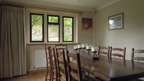 Right-to-Left-Pan-of-a-Dining-Room-in-a-Family-Home