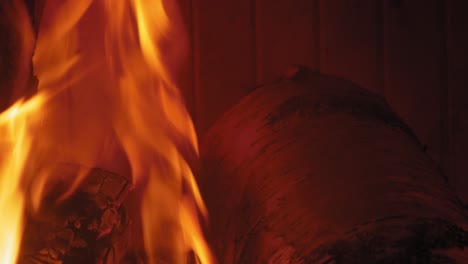 Burning-Flame-At-Fireplace-on-wooden-logs