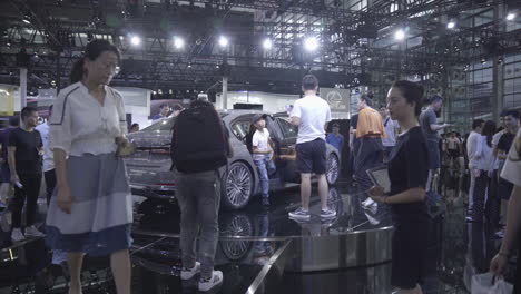 Visitors-surrounded-the-new-BMW-730li-at-2019-International-Auto-Show-in-Shenzhen,-China