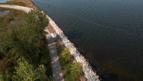 Aerial-point-of-view-of-the-Muskegon-Bike-Path-along-the-coast-of-Muskegon-Lake