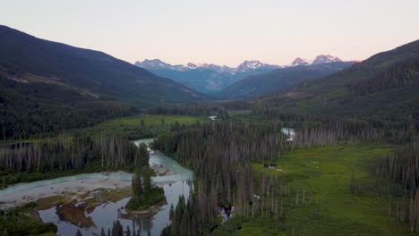 Soo-River-with-Marshland-and-Winding-Stream-with-Mountain-Landscape-Background-Pacific-Ranges-Pemberton-Meadows-Canada-British-Columbia-4K