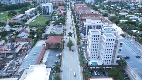 Aerial-View-of-Road-Traffic-and-Construction-Site-in-Boca-Raton-City,-Florida-USA,-Dolly-Drone-Shot