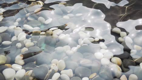 Slow-Motion-Of-Clear-Water-At-Pond-With-Sunlight-Reflection