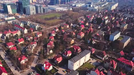 Drone-flying-forward-above-the-red-houses-province