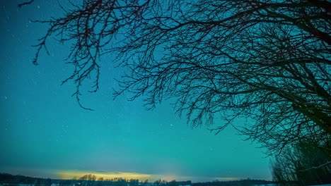 Timelapse-shot-of-star-movement-over-rural-countryside-from-evening-to-night-time