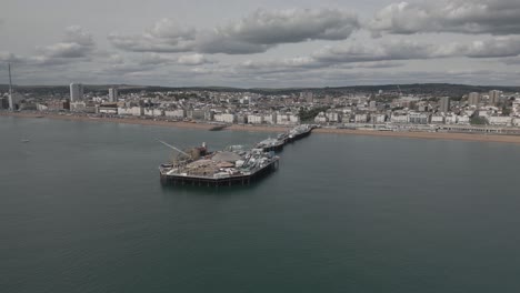 Circling--the-Brighton-Pier,-UK---drone-video