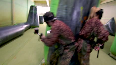 Girls-and-boys-playing-paintball-indoor-paintball-2