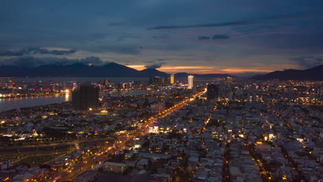 Hyper-Lapse-over-Cityscape-at-Dusk---City-Lights-and-Chaotic-Traffic-in-Vietnam