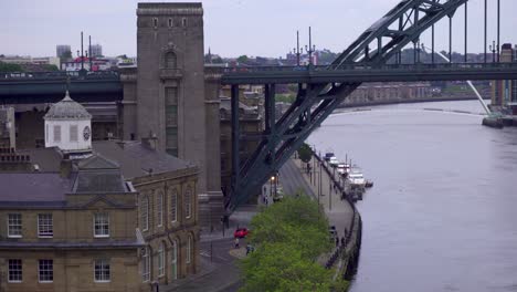 Zoomed-in-shot-of-the-epic-strucuture-of-the-Tyne-Bridge-in-Newcastle-upon-Tyne-showing-the-busy-traffic-and-nesting-sea-birds