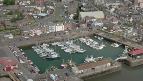 An-aerial-view-of-Arbroath-harbour-and-town-on-a-cloudy-day