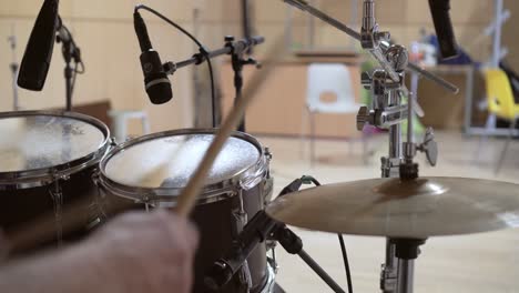 Close-up-of-playing-hi-hat-drums-kit-in-studio,-closeup