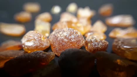 Natural-Baltic-Amber-Stones-On-a-Black-Background-1