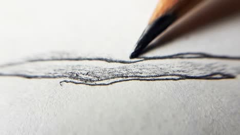 The-Pencil-Draws-Uneven-Random-Lines-on-a-White-Paper