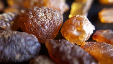 Natural-Baltic-Amber-Stones-On-a-Black-Background-2