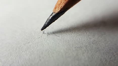 The-drawing-pencil-does-not-hesitate-to-start-drawing-on-white-paper