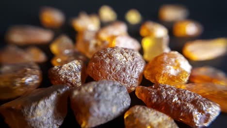 Natural-Baltic-Amber-Stones-On-a-Black-Background-3
