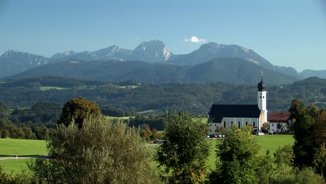 Bavarian-alps-and-church-of-pilgrimage-Wilparting-in-summertime,-Germany